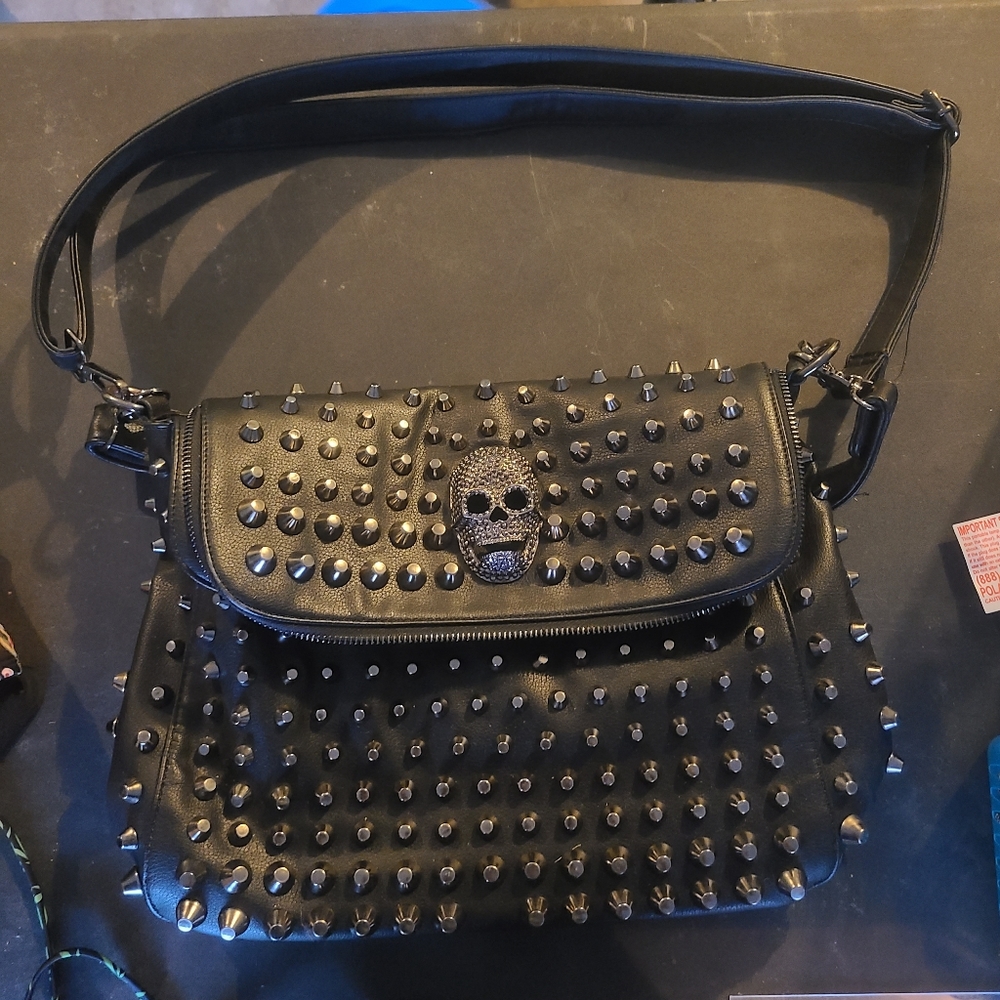 Spiked skull bag